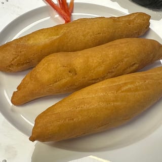 Festival (3) Flour, cornmeal, sugar, spices, vanilla made into a dough then portioned and fried to order